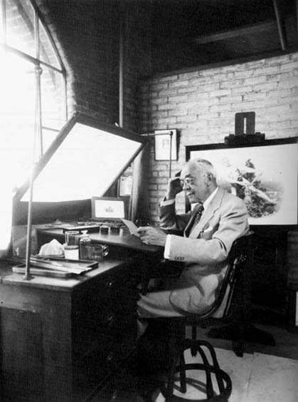 Elie T. Loizeaux at his desk